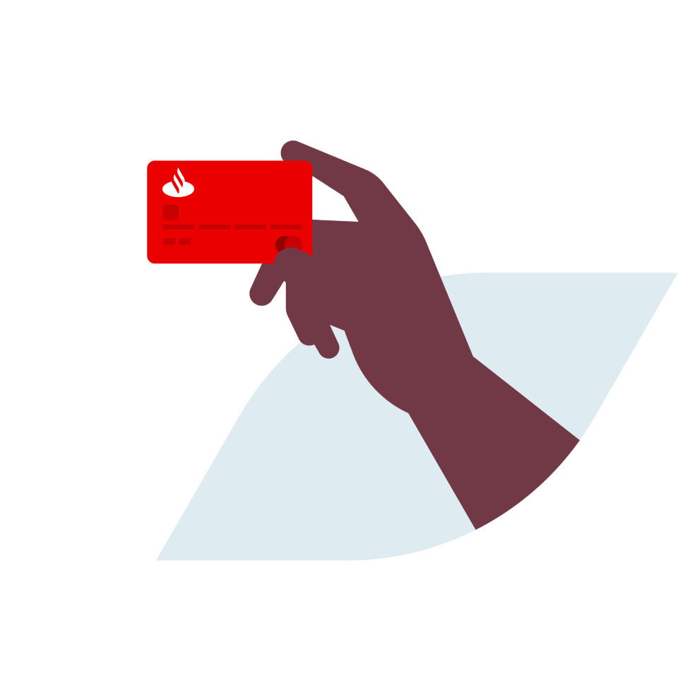 Hand håller upp ett rött kreditkort med Santander logotyp